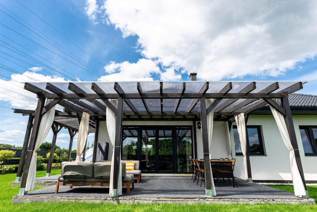 The,Terrace,Behind,The,House,Has,Visible,Beam,Connections,,The