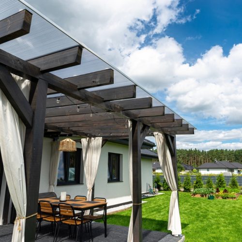The,Terrace,Behind,The,House,Is,Made,Of,Beams,,The